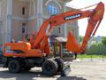 Экскаватор на пневмоходу Doosan S180W-V 2013г