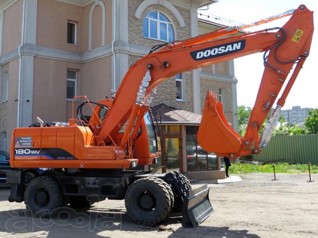 Экскаватор на пневмоходу Doosan S180W-V 2013г